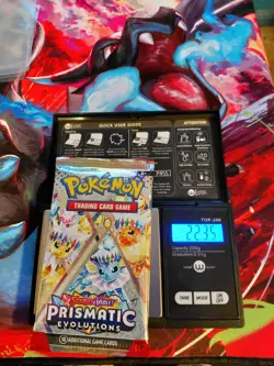 Pokemon Scarlet & Violet Prismatic Evolutions Sealed Booster Weighs 22.35 grams - Image 1