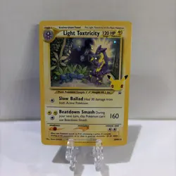 Light Toxtricity 2021 Celebrations Black Star Promo SWSH137 Pokemon Card - Image 1