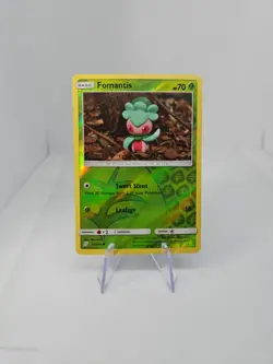 Fomantis 15/236 SM Unified Minds Reverse Holo Yuka Morii Pokemon TCG - Image 1