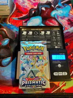 Pokemon Scarlet & Violet Prismatic Evolutions Sealed Booster Weighs 22.26 grams - Image 1