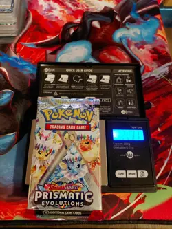 Pokemon Scarlet & Violet Prismatic Evolutions Sealed Booster Weighs 22.31 grams - Image 1