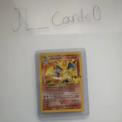 Pokemon Charizard 4/102 Base Set Holo Rare TCG English 1999 25th anniversary - Image 1