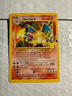 Charizard 4/102 Celebrations: Classic Collection Holo Pokemon Card - Image 1