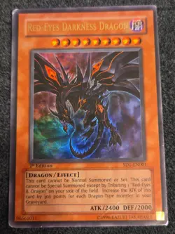 Yugioh Red-Eyes Darkness Dragon SD1-EN001 Ultra Rare In HP Damaged Condition - Image 1