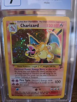 Charizard 004/130 Base Set 2 Holo Graded CGC 7 - Image 1