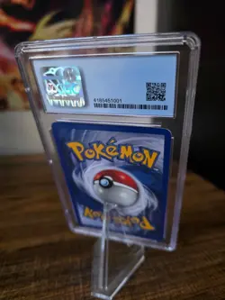 Charizard 004/130 Base Set 2 Holo Graded CGC 7 - Image 2