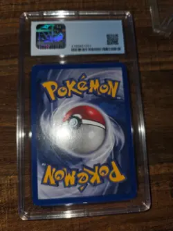 Charizard 004/130 Base Set 2 Holo Graded CGC 7 - Image 4
