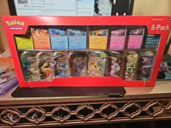 New & Sealed Pokemon TCG Prismatic Evolutions Costco Mini Tins 8 Pack - Image 1