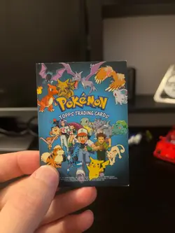 TV Animation Checklist Non-Holo, Blue Logo - Pokemon Topps Series 1 - 1999 - Image 1