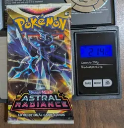 Sword & Shield Astral Radiance Booster Pack & Eevee Coin - Heavy 21.42g Pokemon - Image 1