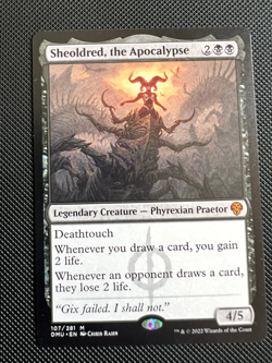 Sheoldred, the Apocalypse Dominaria United #107 MTG NM Pre-Owned - Image 1