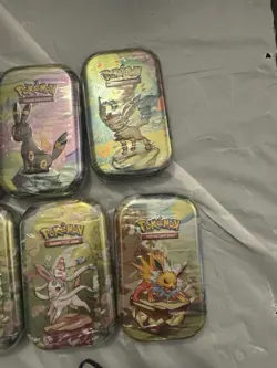 10 Pokemon TCG: Scarlet & Violet Prismatic Evolutions Mini Tins - Factory Sealed - Image 3