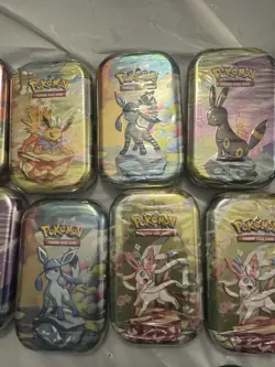 10 Pokemon TCG: Scarlet & Violet Prismatic Evolutions Mini Tins - Factory Sealed - Image 4