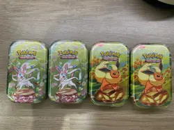 Pokemon Prismatic Evolutions x4 Mini Tins – Sealed – IN-HAND - Image 1