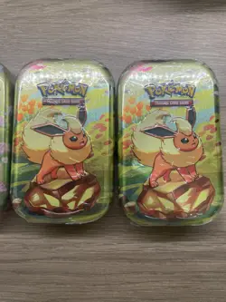 Pokemon Prismatic Evolutions x4 Mini Tins – Sealed – IN-HAND - Image 3