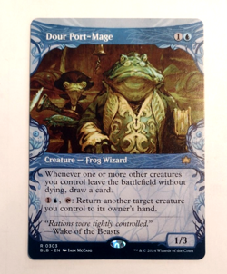 Dour Port-Mage (Showcase) - Bloomburrow (BLB) - EN - R 0303 - Image 1
