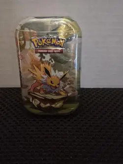 Pokemon TCG Scarlet & Violet Prismatic Evolutions Jolteon Mini Tin Sealed - Image 1