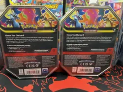 Pokemon TCG Mega Evolution Mega Charizard X ex and Y ex Promo 2 Tin Set - Sealed - Image 2