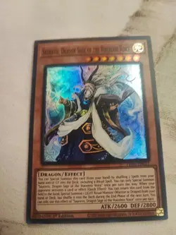 YuGiOh Sauravis, Dragon Sage of the Voiceless Voice PHNI-EN021 Super Rare 1st Ed - Image 1