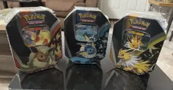 Pokemon TCG: Eevee Evolutions Tin (Set Of 3) Jolteon/Vaporeon/Flareon - Image 1