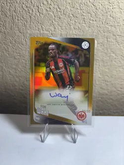 2025-26 Topps UEFA Club Competitions BA-WA Elye Wahi GOLD Foil Auto #/50 - Image 1