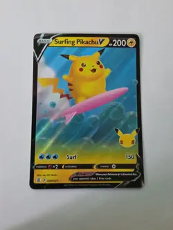 Surfing Pikachu V #8/25 Celebrations 2021 Holo Near Mint Pokemon TCG - Image 1