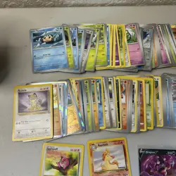 Pokemon Trading Card Game Mixed Card Lot with Vintage, Ultra Rare, Charizard Tin - Image 2