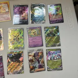 Pokemon Trading Card Game Mixed Card Lot with Vintage, Ultra Rare, Charizard Tin - Image 5