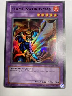 Yugioh Flame Swordsman LOB-003 Super Rare - MINT - Grading Ready - Never Played - Image 1