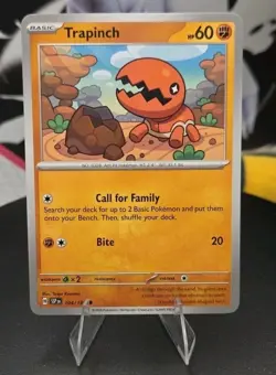 Trapinch 104/191 Sv08: Surging Sparks Regular - Pokemon - Free Shipping - NM - Image 1