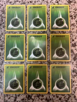 1999 Original Pokemon Base Set: Green Grass Leaf Energy 99/102 (9) card lot - Image 1