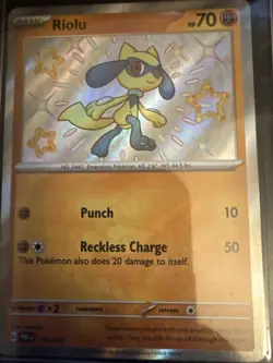Pokemon TCG Riolu Card Paldean Fates Baby Shiny NM Condition 173/091 - Image 1