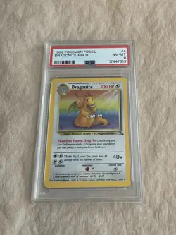 PSA 8 Dragonite Holo #4 Fossil Pokemon TCG 1999 - Image 1