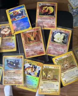 Lot of 34 Holo Rare and Other Pokemon cards - Image 1