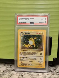 1999 Pokemon Base Set Unlimited Raichu Holo #14 PSA 8 - Image 1