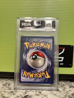 1999 Pokemon Base Set Unlimited Raichu Holo #14 PSA 8 - Image 2