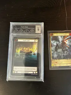 Flesh and Blood - Fool's Gold Cold Foil Promo PCG 9 + Bonus Ketch Treasure Card - Image 1