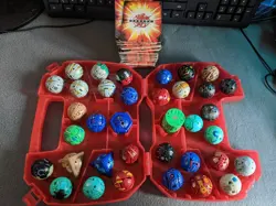 Bundle of 32 Bakugan Battle Brawlers With Case And Massive Lot Of Cards - Image 1