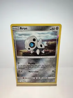 Aron 123/214 Common Unbroken Bonds Pokemon Reverse Holo Near Mint - Image 1