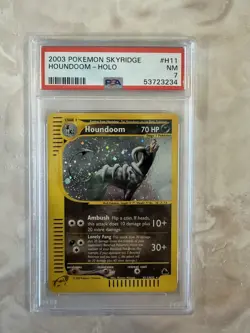 2003 POKEMON SKYRIDGE #H11 HOUNDOOM-HOLO PSA 7 - Image 1