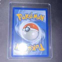 Pikachu 30th Anniversary Holo Card with Pikachu looking at a swirl in the sky - Image 3