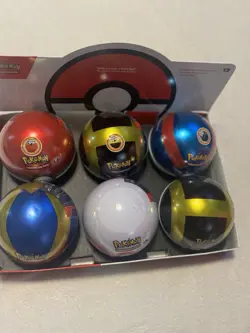 New Sealed Pokemon TCG Poke Ball Blue /Gold Tin with 3 Booster Packs & 1 Coin - Image 1