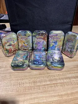 Pokemon TCG Prismatic Evolutions Complete Set of 8 Sealed Mini Tins - Eevee Set - Image 1