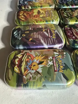 Pokemon Scarlet Violet Prismatic Evolutions Mini Tin Set Lot Of 8 New Sealed - Image 4