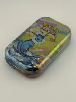 Pokemon TCG Prismatic Evolutions Vaporeon Mini Tin Sealed - Image 1