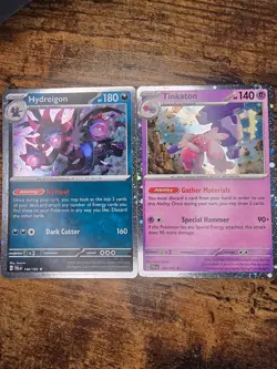 EU Exclusive Cosmos Holo Promos – Hydreigon 140 & Tinkaton 105 NM Pokemon Cards - Image 1