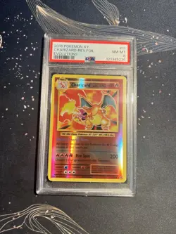 2016 POKEMON XY CHARIZARD-REV. FOIL EVOLUTIONS PSA MINT 8 - Image 1