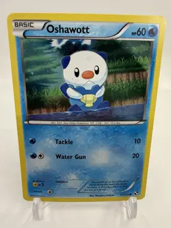 2011 Pokemon, Black & White Base Promos, #27/114 Oshawott Cosmos Holo Swirl - Image 1