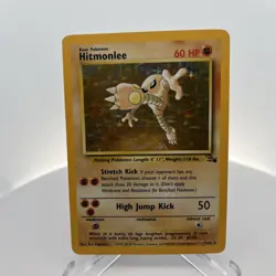 MP Condition Hitmonlee Holo Rare Fossil 7/62 Pokemon Card - Image 1