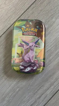 Pokemon TCG Prismatic Evolutions Mini Tin Espeon Art - Image 1